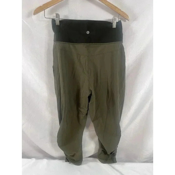 Lululemon Sunset Salutation Crop Leggings Sz 8 Fatigue Green/Ziggy Snake Pockets - Picture 3 of 10